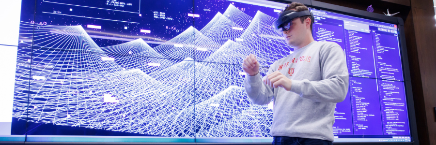 Student using VR headset in advanced visualization lab in the Idea Garden in Hine Hall at IU Indianapolis
