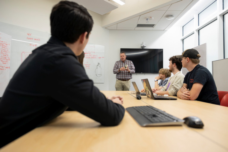 Student coding with Python