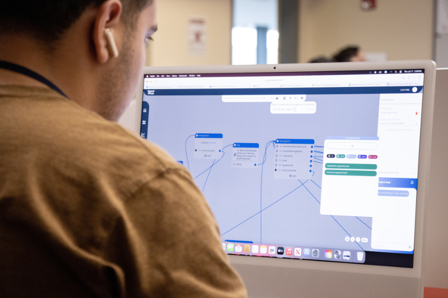 Student coding in RStudio