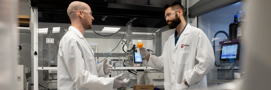 Researchers working in a chemistry lab at the Indiana Biosciences Research Institute (IBRI).